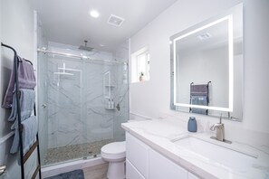 Hair dryer, towels, soap, shampoo