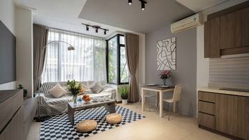 Apartment, 1 Bedroom, City View | 1 bedroom, minibar, desk, laptop workspace