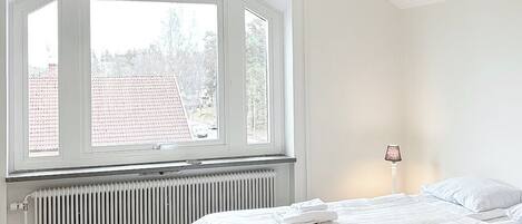 Family Apartment | Egyptian cotton sheets, premium bedding, laptop workspace