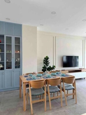 Villa, Balcony, Garden View | Living area | 55-inch LCD TV with cable channels