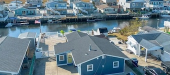 Beautifully updated waterfront home great for families & friends +beach badges.