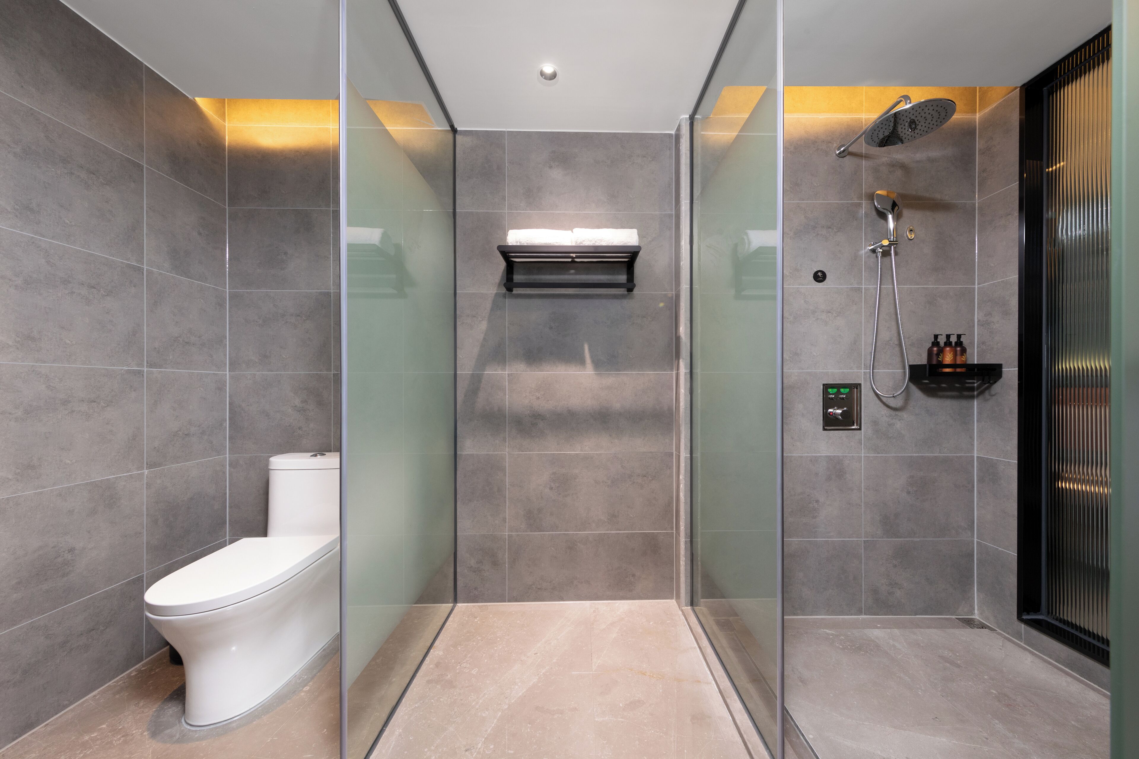 Shower, hair dryer, slippers, towels