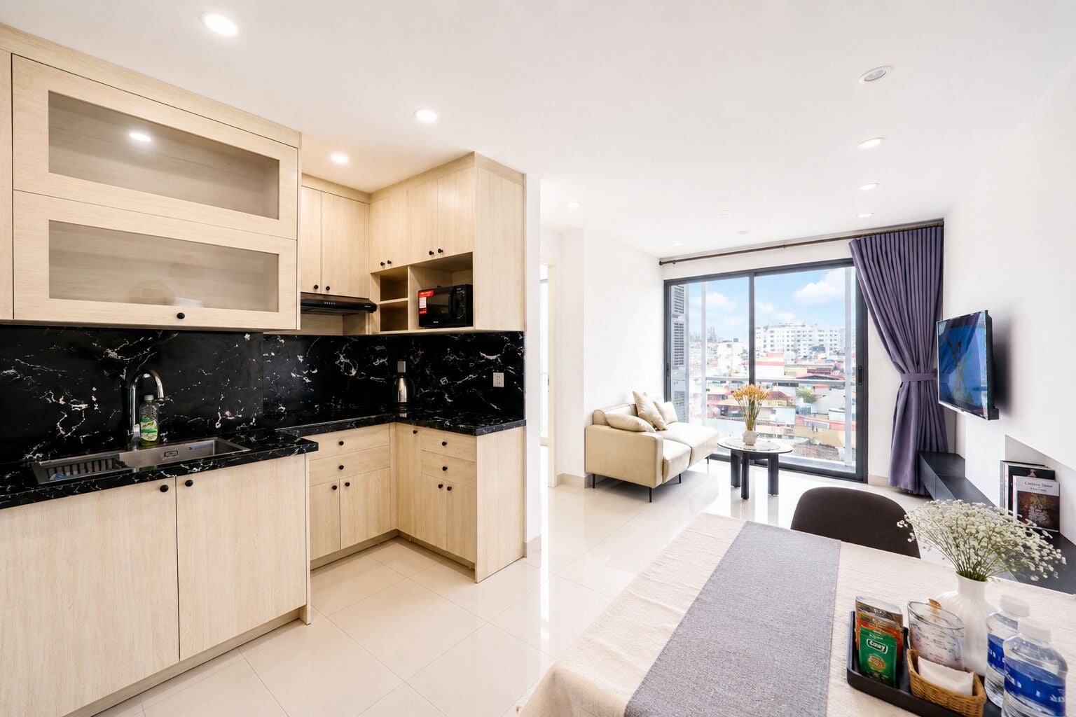 Family Apartment, Balcony, City View | Shared kitchen facilities | Full-size fridge, microwave, oven, stovetop