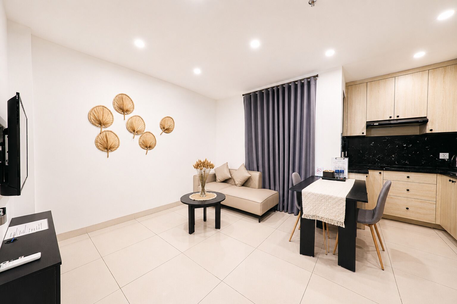 Basic Apartment | Living area | 24-inch LCD TV with cable channels