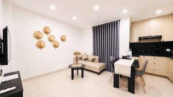 Basic Apartment | Living area | 24-inch LCD TV with cable channels