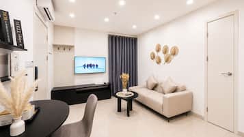 Basic Apartment | Living area | 24-inch LCD TV with cable channels