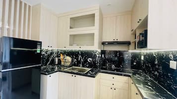 Family Apartment, Balcony, City View | Private kitchen | Full-size fridge, cookware/dishes/utensils, paper towels