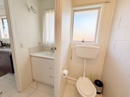 Room, 1 Bedroom, Kitchenette | Bathroom | Hair dryer, towels, soap, shampoo