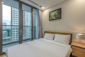 Apartemen Deluks, 1 kamar tidur | 1 kamar tidur, meja kerja, tirai kedap cahaya, dan Wi-Fi gratis