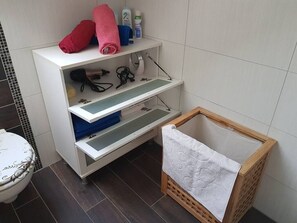 Hair dryer, towels, soap, toilet paper