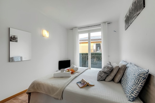 Appartement familial, plusieurs chambres (Residence Due Laghi) | 1 chambre, accès au Wi-Fi (inclus), literie fournie