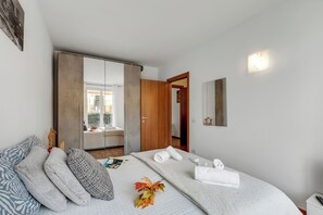 Appartement familial, plusieurs chambres (Residence Due Laghi) | 1 chambre, accès au Wi-Fi (inclus), literie fournie
