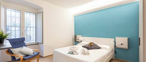Family Apartment, Multiple Bedrooms (Central Flat In Genova) | 2 bedrooms, iron/ironing board, free WiFi, bed sheets