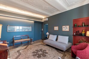 Standard Apartment, Multiple Bedrooms, Sea Facing (Precious House Genova Porto Antico) | Living area | 21-inch Smart TV with cable channels