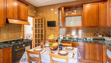 Family Apartment, 3 Bedrooms (Bright Apartment Private Parking) | Private kitchen | Fridge, oven, stovetop, coffee/tea maker
