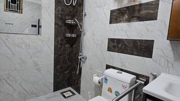 Basic Double Room, Balcony, Garden View | Bathroom | Hair dryer, towels, soap