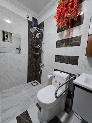Basic Double Room, Balcony, Garden View | Bathroom | Hair dryer, towels, soap