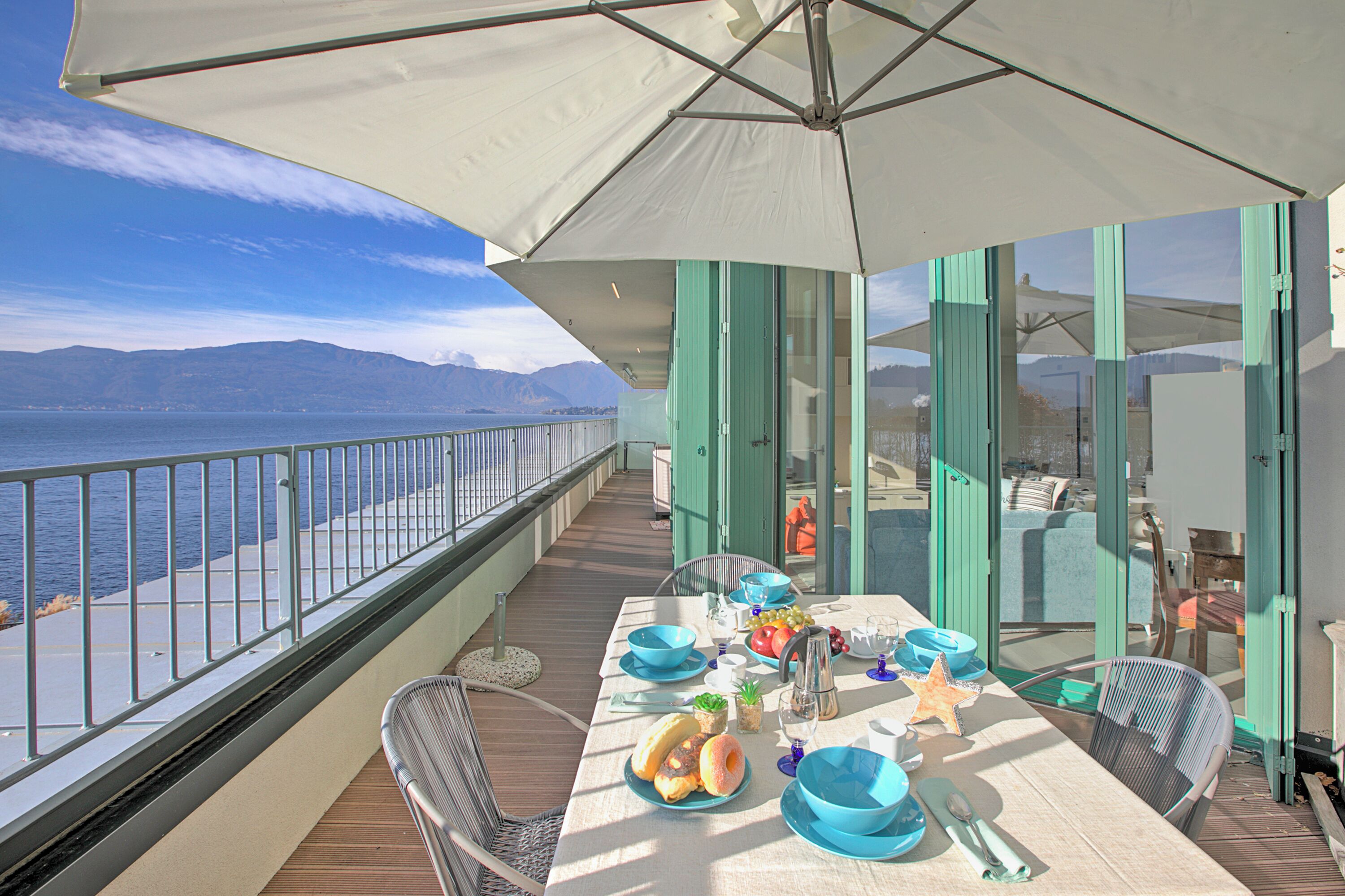 Departamento familiar, varias habitaciones, junto al lago (Sogno Sul Lago  Lake Front) | Restaurante al aire libre