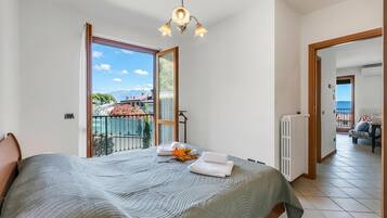 Standard Apartment, Multiple Bedrooms, Mountainside (Julia's House lakeview & shared pool) | 2 bedrooms, free WiFi, bed sheets