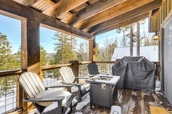 A wooden deck with chairs and a grill, overlooking a snowy landscape. - Black Hills Cabin w/ Hot Tub! 20 Mi to Sturgis (Lead)
