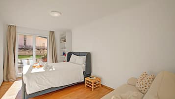 Family Apartment, Multiple Bedrooms, 2 Bathrooms (Ô Lac Ascona with Garden) | 2 bedrooms, iron/ironing board, free WiFi, bed sheets