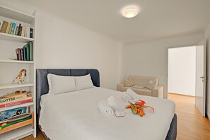 Family Apartment, Multiple Bedrooms, 2 Bathrooms (Ô Lac Ascona with Garden) | 2 bedrooms, iron/ironing board, free WiFi, bed sheets