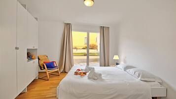 Family Apartment, Multiple Bedrooms, 2 Bathrooms (Ô Lac Ascona with Garden) | 2 bedrooms, iron/ironing board, free WiFi, bed sheets