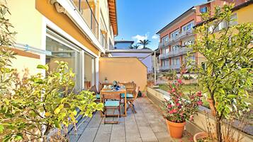 Family Apartment, Multiple Bedrooms, 2 Bathrooms (Ô Lac Ascona with Garden) | Outdoor dining