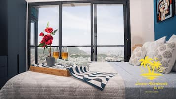 2 chambres, coffres-forts dans les chambres, fer et planche Ă  repasser