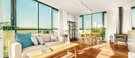 Apartment, Sea View | Living area | TV