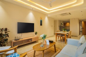 Apartment, 2 Bedrooms, Balcony, City View | Living area | Flat-screen TV