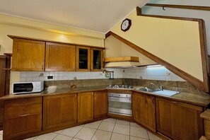 Family Townhome, Multiple Bedrooms (Borgo di Porlezza) | Private kitchen - Borgo di Porlezza (Porlezza)