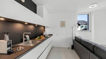 Family Apartment, 2 Bedrooms, 2 Bathrooms (Corte di Ascona 3) | Private kitchen | Fridge, oven, stovetop, dishwasher
