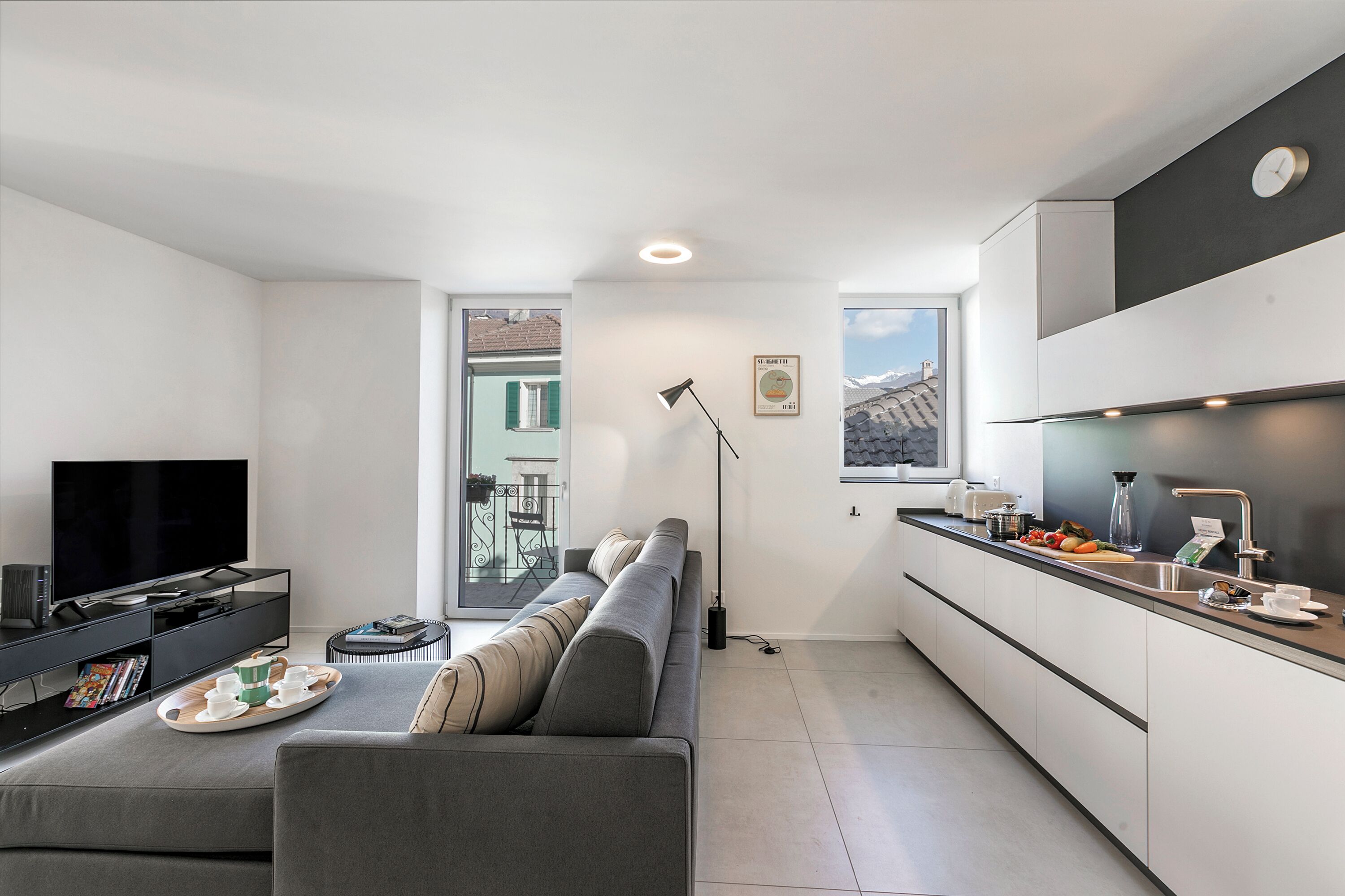 Family Apartment, Multiple Bedrooms, 2 Bathrooms (Corte di Ascona 4) | Living area | 21-inch flat-screen TV with cable channels