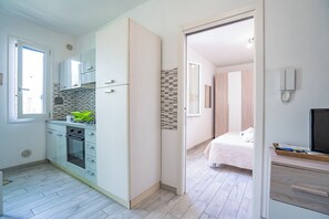 Family Apartment, Multiple Bedrooms (Casa Graziano 2 Near Sandy Beach) | Private kitchen