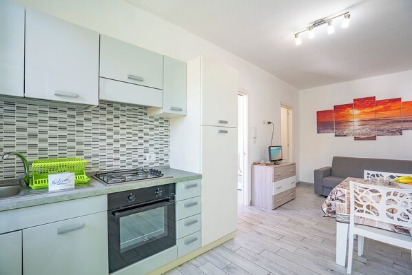 Family Apartment, Multiple Bedrooms (Casa Graziano 2 Near Sandy Beach) | Private kitchen