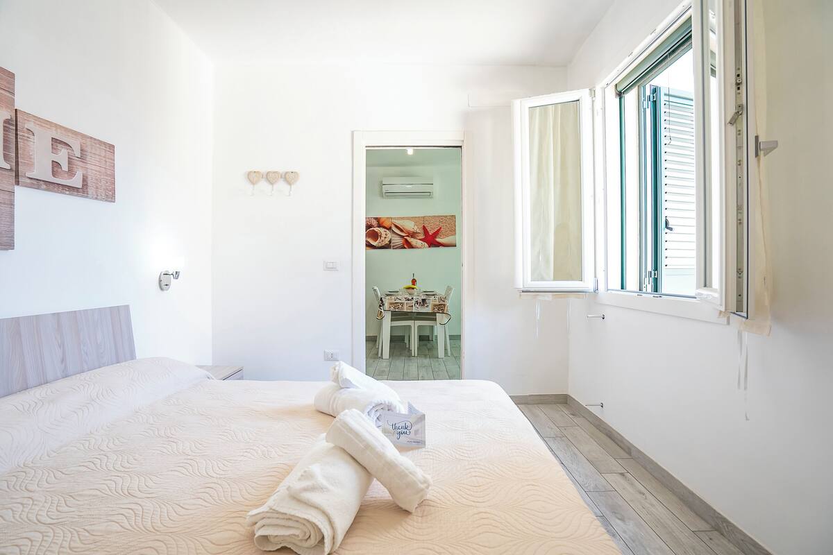 Departamento familiar, varias habitaciones (Casa Graziano 2 Near Sandy Beach) | 1 habitación, wifi gratis y ropa de cama