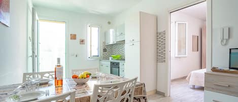 Family Apartment, Multiple Bedrooms (Casa Graziano 2 Near Sandy Beach) | Private kitchen | Fridge, oven, stovetop, coffee/tea maker