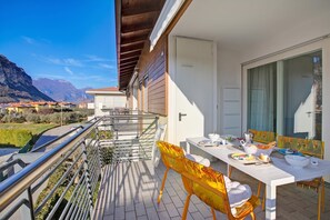 Departamento familiar, varias habitaciones (Torbolino) | Restaurante al aire libre