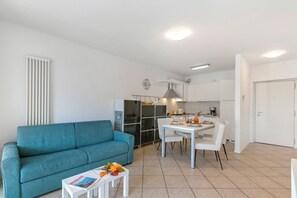 Family Apartment, Multiple Bedrooms (Torbolino) | Dining
