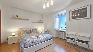 Family Apartment, 1 Bedroom (Lugano Bay View Uno) | 1 bedroom, iron/ironing board, free WiFi, bed sheets