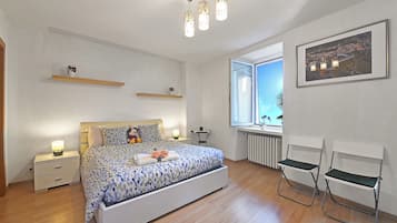 Family Apartment, Multiple Bedrooms (Lugano Bay View Uno) | 1 bedroom, iron/ironing board, free WiFi, bed sheets