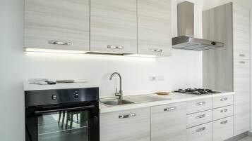 Standard Apartment, 2 Bedrooms, Sea Facing (Villa Blu Panoramica Trilo Sea View) | Private kitchen | Fridge, oven, stovetop, coffee/tea maker