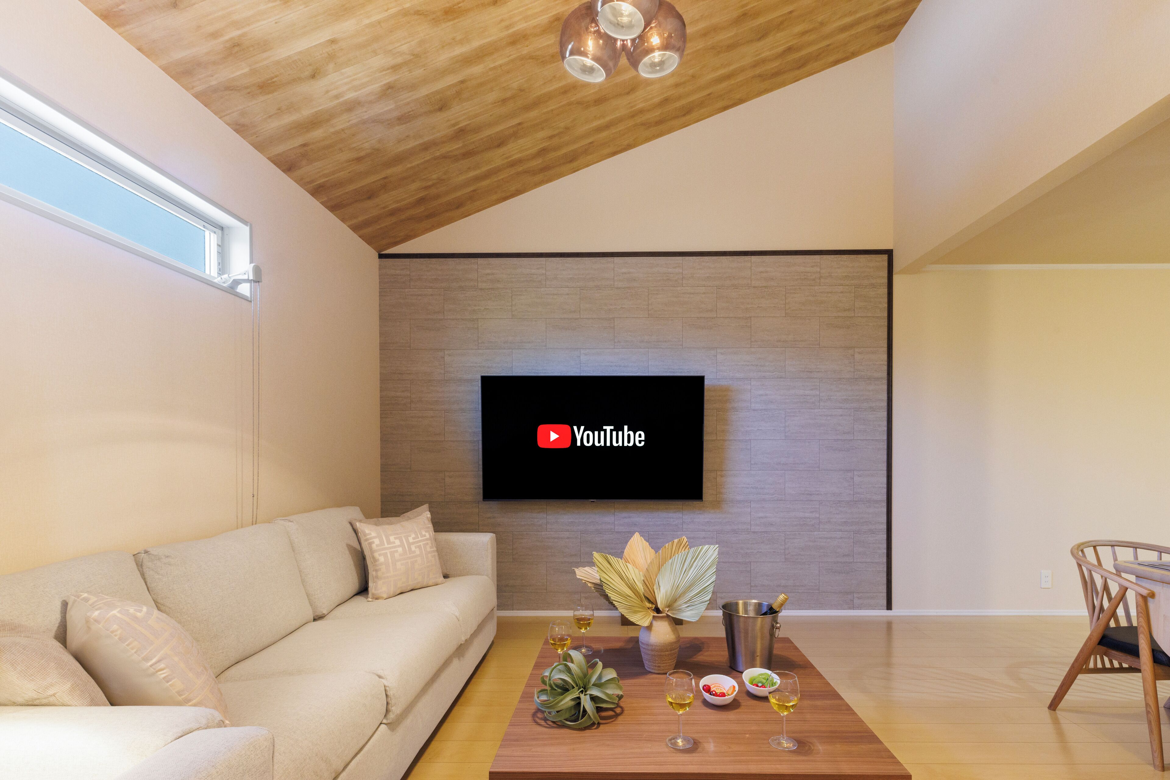 Executive Villa | Living area | 65-inch flat-screen TV with cable channels