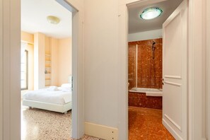 Hair dryer, bidet, towels, toilet paper