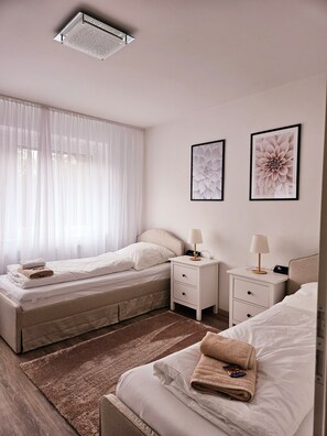 2 habitaciones, tabla de planchar con plancha y wifi gratis