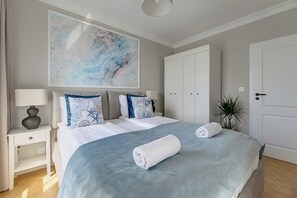 Apartemen Deluks, pemandangan kota | 1 kamar tidur, setrika/meja setrika, dan Wi-Fi gratis