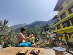 Outdoor dining - Undiscovered Mountains Hotel (Banjar)