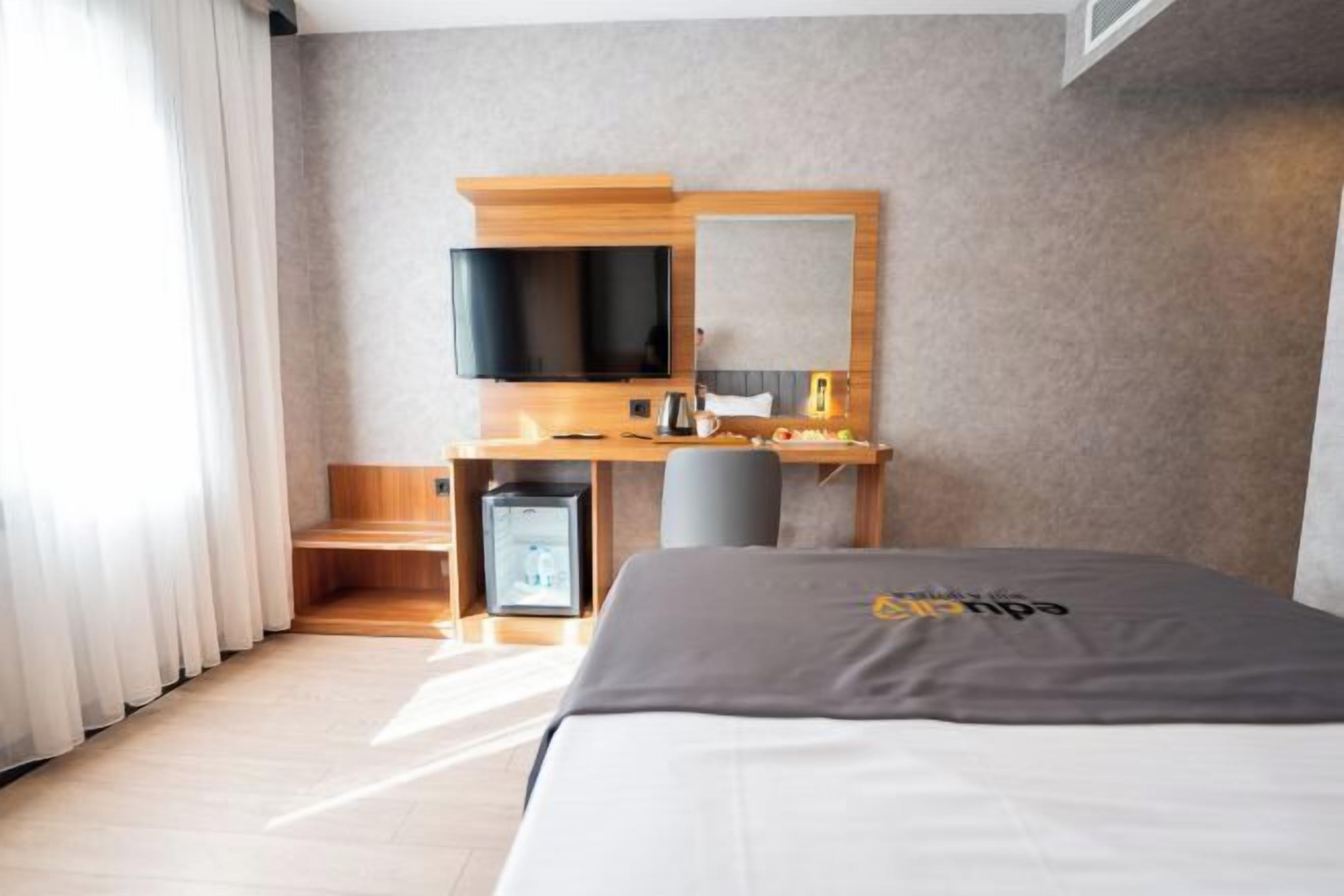 Premium bedding, in-room safe, desk, soundproofing