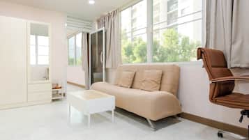 Kamar Premium, 1 kamar tidur, kamar mandi pribadi, pemandangan halaman | 1 kamar tidur, seprai premium, dan selimut bulu angsa